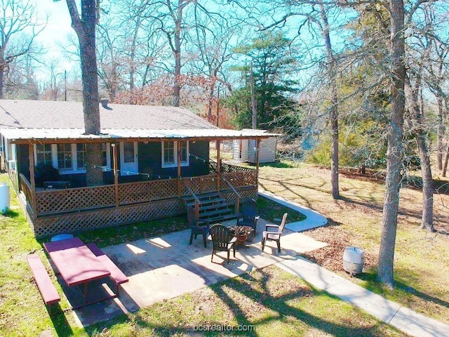 back of house featuring a patio area