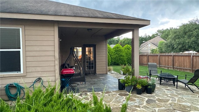 301 Pine Mist Ln, Conroe, TX 77304 - view of patio / terrace featuring an outdoor fire pit