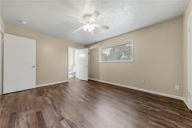 1503 Tara Ct, College Station, TX 77840 - unfurnished living room with ceiling fan, a textured ceiling, dark wood finished floors, a fireplace, and crown molding