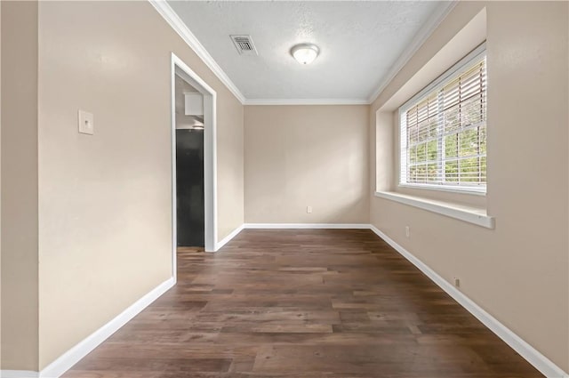 1503 Tara Ct, College Station, TX 77840 - empty room featuring crown molding, dark wood-style floors, and a textured ceiling