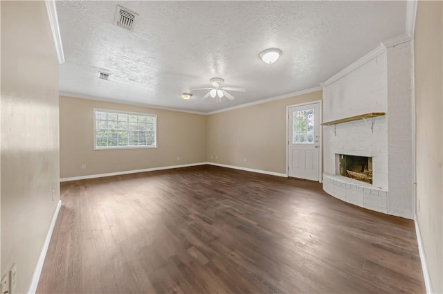 1503 Tara Ct, College Station, TX 77840 - kitchen with stainless steel appliances, under cabinet range hood, ornamental molding, white cabinetry, and tasteful backsplash