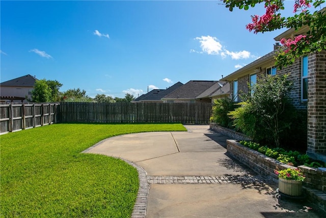 view of yard with a patio area