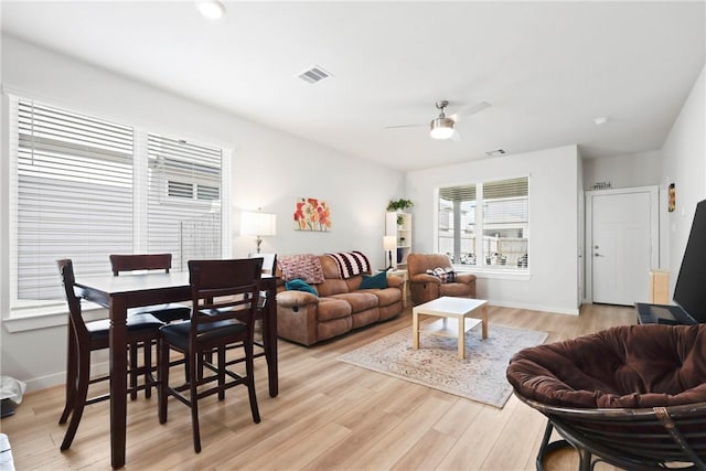 1121 Amistad Loop, College Station, TX 77845 - living room with ceiling fan and light wood-type flooring
