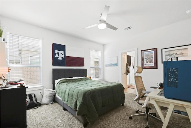 1121 Amistad Loop, College Station, TX 77845 - carpeted bedroom featuring a desk and ceiling fan