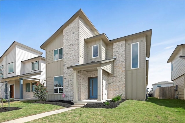 1121 Amistad Loop, College Station, TX 77845 - contemporary home featuring board and batten siding and brick siding