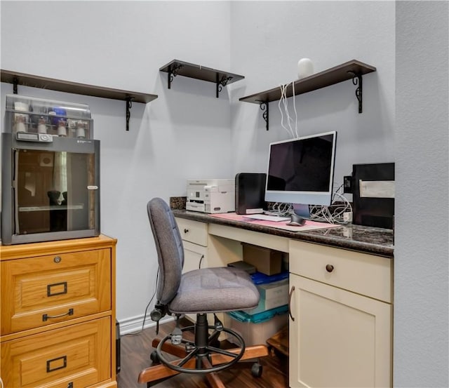 home office with hardwood / wood-style flooring