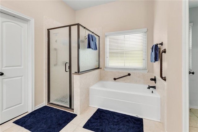 bathroom with tile patterned floors and plus walk in shower