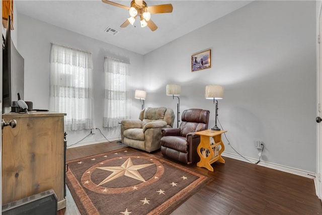 living area with vaulted ceiling, ceiling fan, and hardwood / wood-style floors