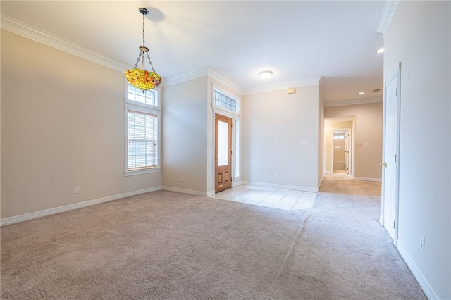 unfurnished room featuring crown molding and light colored carpet