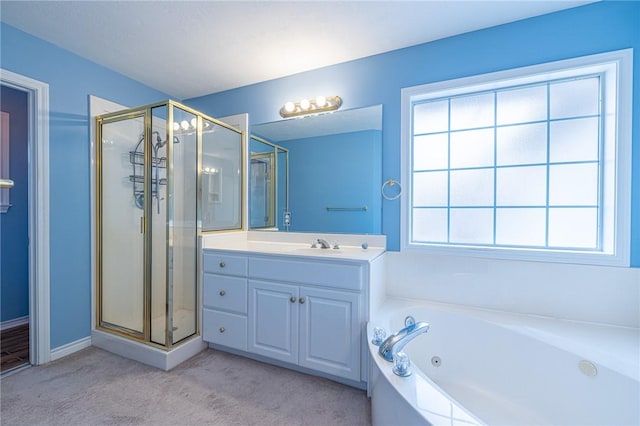 bathroom featuring separate shower and tub and vanity