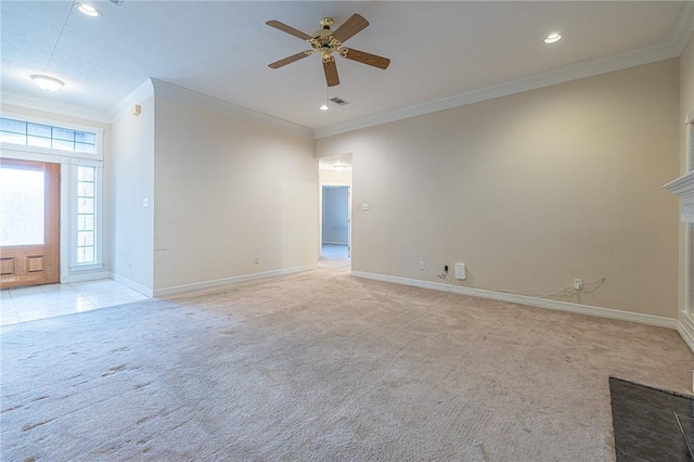 unfurnished living room featuring crown molding, light colored carpet, and ceiling fan