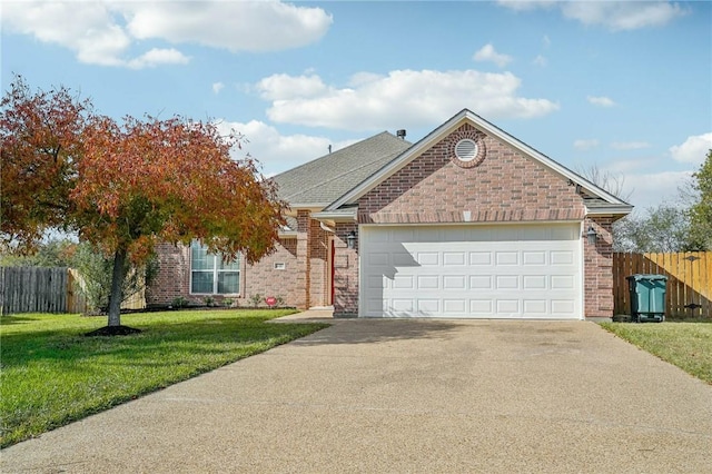 view of front facade featuring a front lawn and a garage