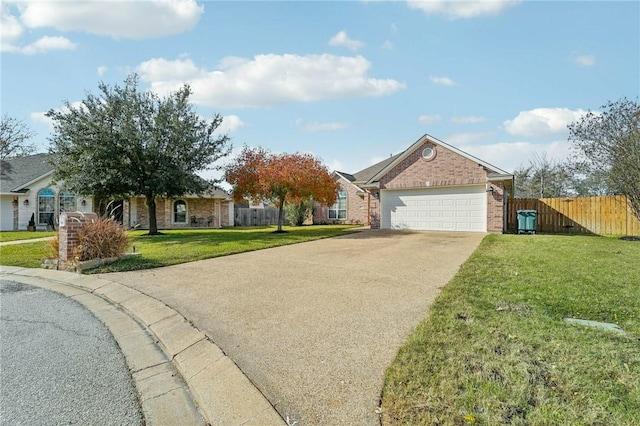 ranch-style home featuring a front yard and a garage