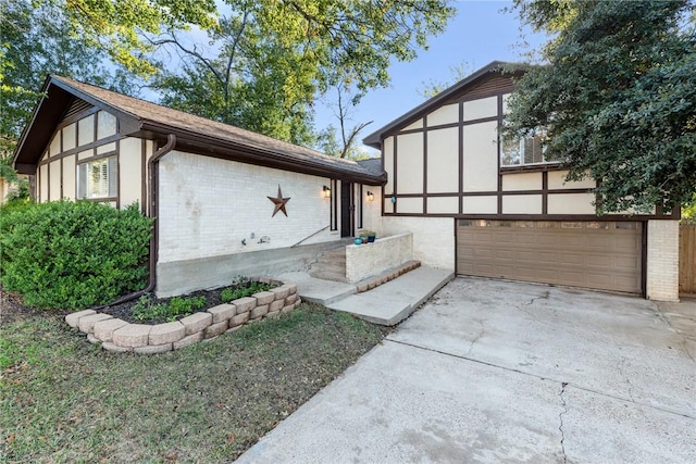 view of side of home with a garage