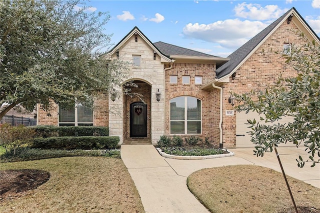 view of front of property with a garage