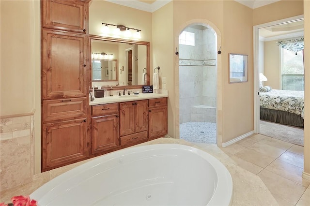 bathroom with vanity, tile patterned floors, ornamental molding, and separate shower and tub