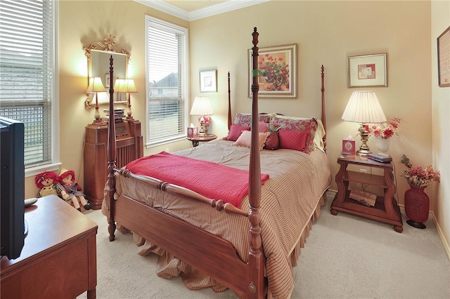 bedroom with crown molding and light colored carpet