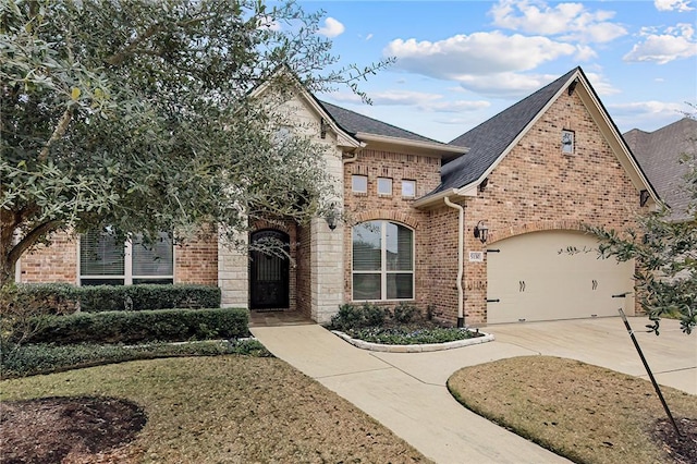 view of front of home with a garage