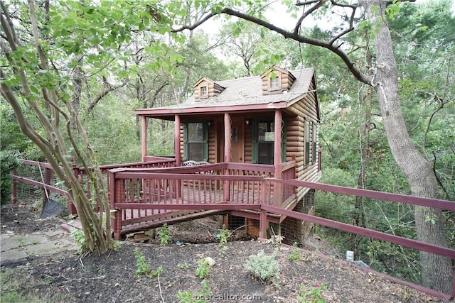 view of front of house with a deck