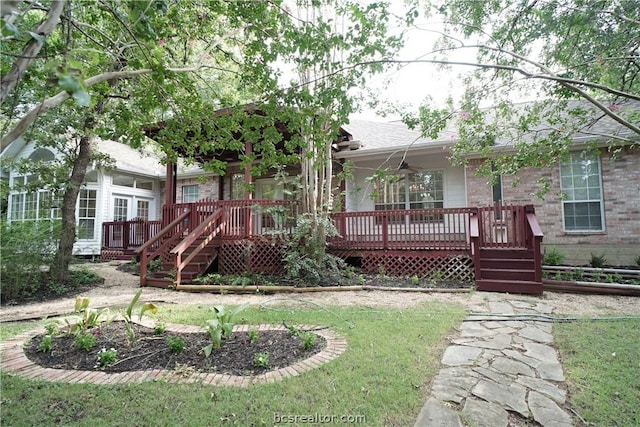 view of front of home with a deck