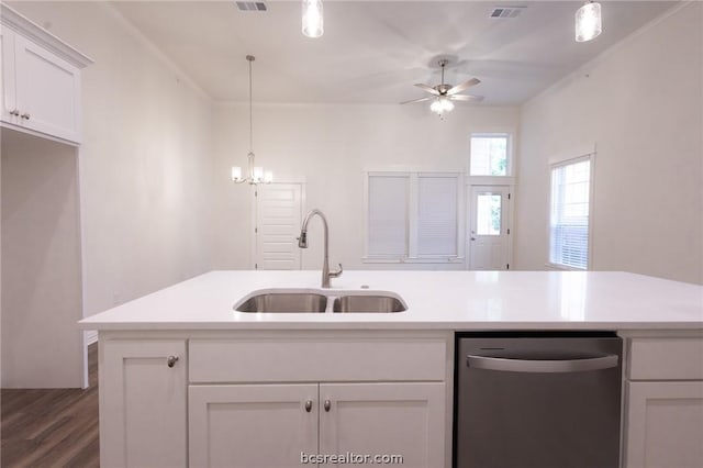 kitchen featuring white cabinetry, dishwasher, sink, dark hardwood / wood-style floors, and pendant lighting