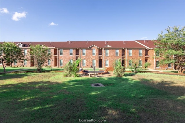 view of community with a lawn