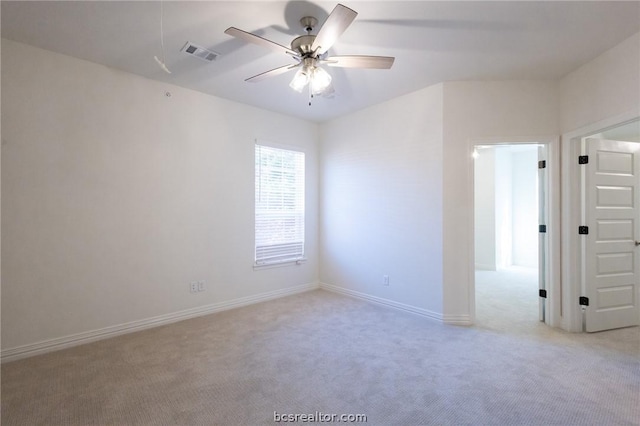 carpeted empty room with ceiling fan