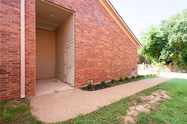 view of home's exterior with a patio area