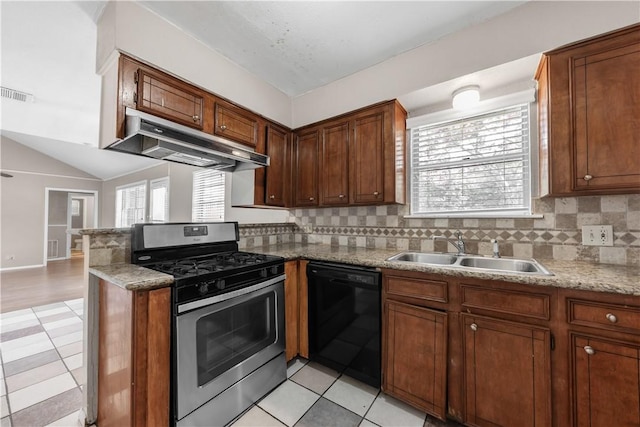 1214 Neal Pickett Dr, College Station, TX 77840 - kitchen featuring gas range, dishwasher, under cabinet range hood, a peninsula, and decorative backsplash