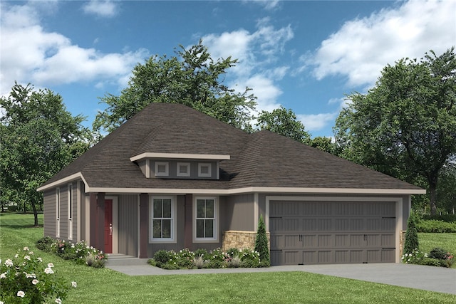 view of front of property with a garage and a front yard