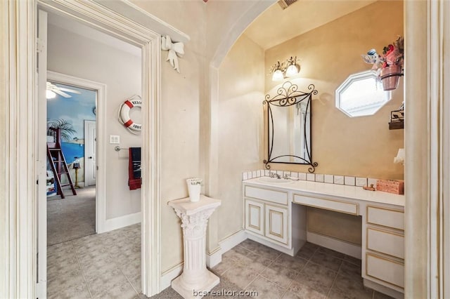 bathroom with vanity and ceiling fan