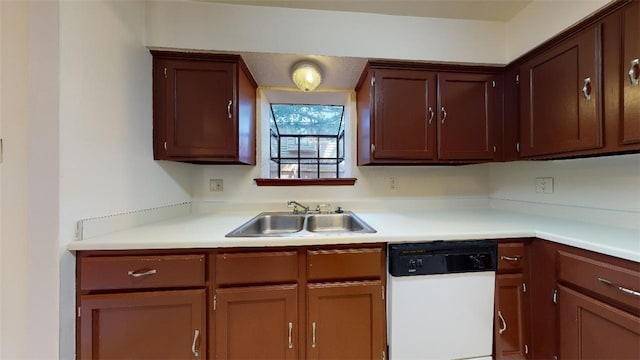 kitchen with white dishwasher and sink