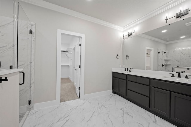 bathroom featuring a shower with door, ornamental molding, and vanity