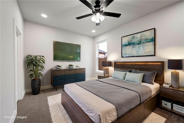 carpeted bedroom featuring ceiling fan