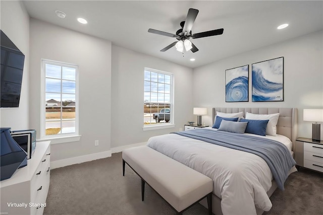 carpeted bedroom with ceiling fan