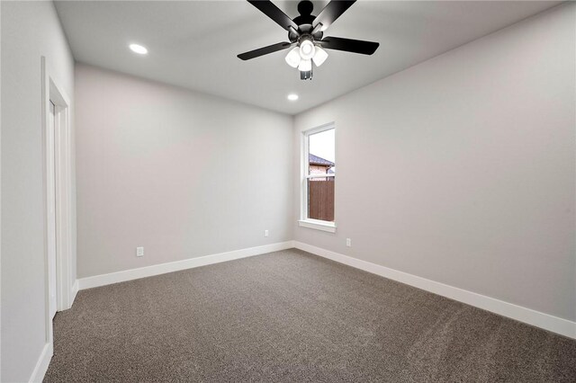 carpeted empty room with ceiling fan