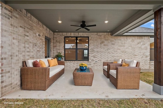 view of patio featuring ceiling fan and an outdoor hangout area