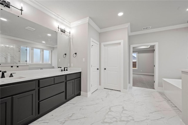 bathroom with a bath, ornamental molding, and vanity