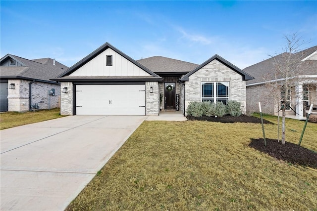 view of front facade with a garage and a front lawn