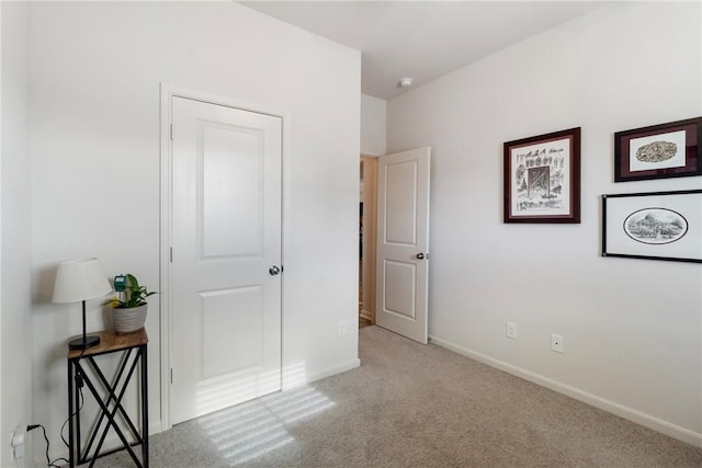 bedroom with light carpet