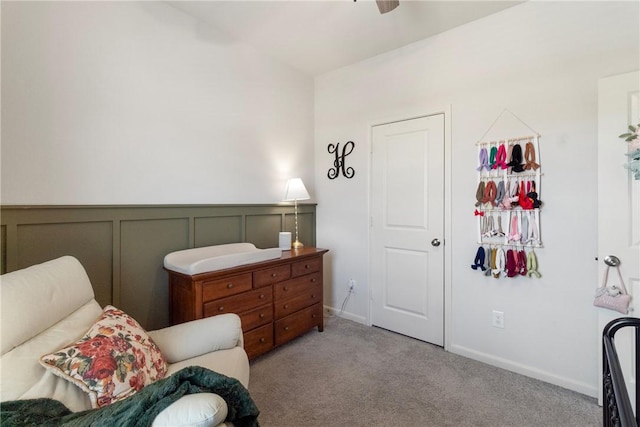 bedroom featuring ceiling fan and light colored carpet