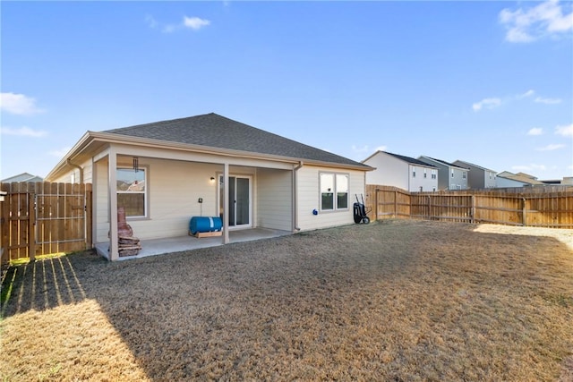 back of property featuring a patio area