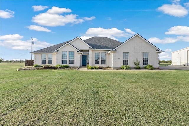 view of front of property with a front lawn