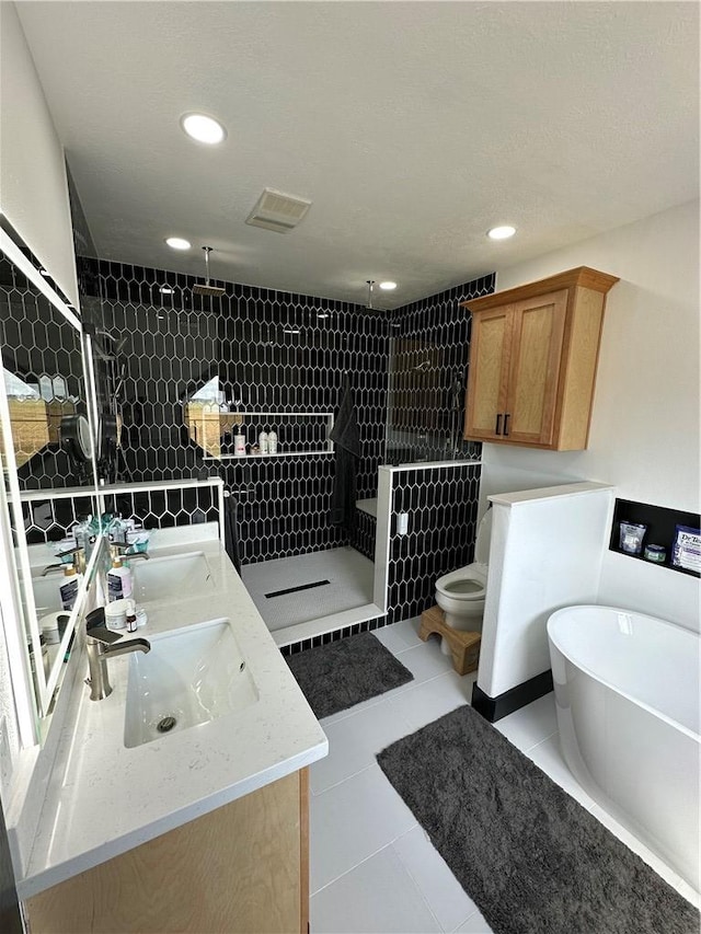 full bathroom featuring vanity, plus walk in shower, tile walls, tile patterned flooring, and toilet