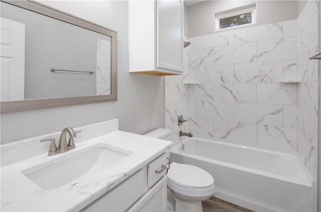 507 Brosig Ave, Navasota, TX 77868 - full bath featuring vanity, shower / washtub combination, and wood finished floors