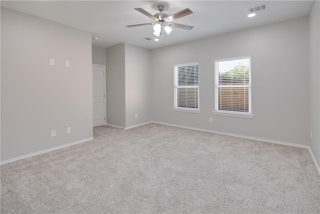 507 Brosig Ave, Navasota, TX 77868 - empty room featuring light colored carpet, a ceiling fan, and recessed lighting