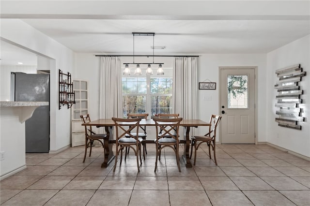 view of tiled dining space