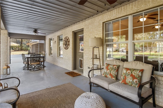 view of patio featuring ceiling fan