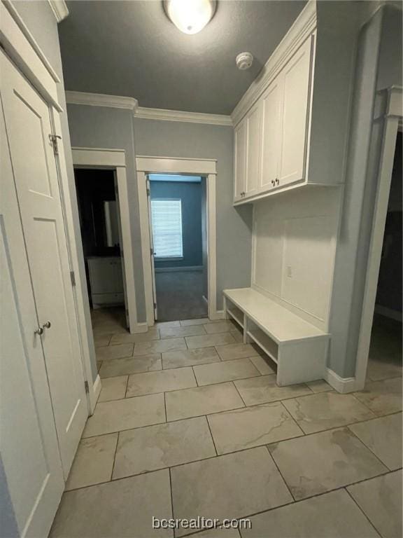 mudroom with crown molding