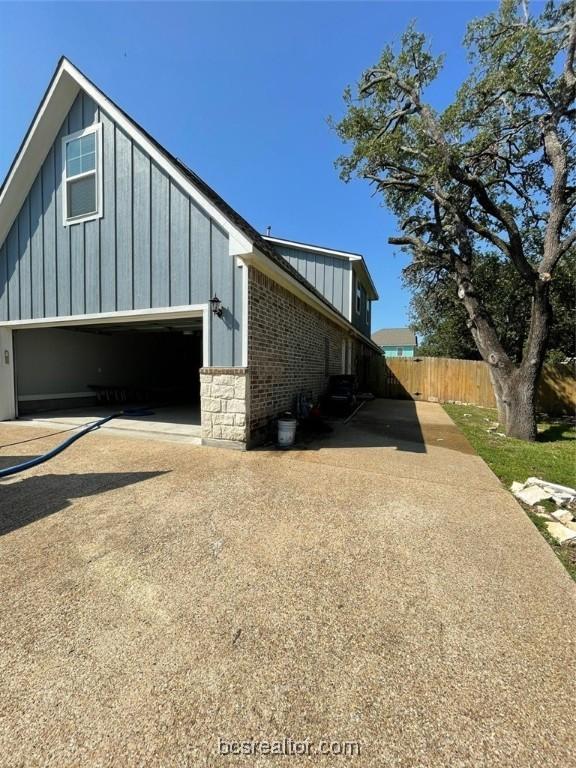 view of property exterior featuring a garage